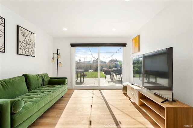 10290 Monte Vista Ave, Montclair, CA 91763 - living area with wood finished floors and recessed lighting