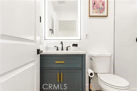 10290 Monte Vista Ave, Montclair, CA 91763 - bathroom with vanity and toilet