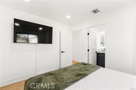 10290 Monte Vista Ave, Montclair, CA 91763 - bedroom featuring wood finished floors, recessed lighting, and baseboards