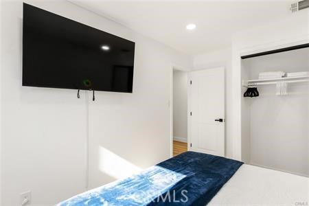 10290 Monte Vista Ave, Montclair, CA 91763 - bedroom featuring a closet and recessed lighting