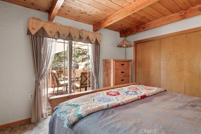38855 Big Bear Blvd, Big Bear Lake, CA 92315 - carpeted bedroom with beam ceiling, wooden ceiling, baseboards, a closet, and access to exterior