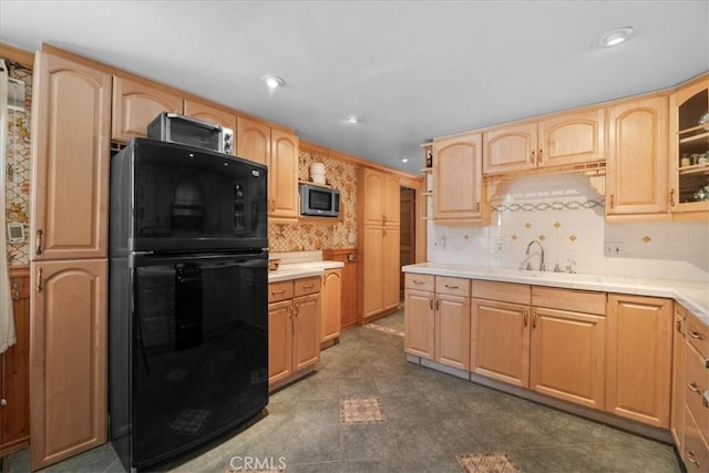 38855 Big Bear Blvd, Big Bear Lake, CA 92315 - kitchen with freestanding refrigerator, a sink, light brown cabinets, stainless steel microwave, and glass insert cabinets