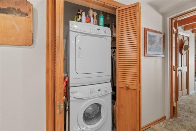38855 Big Bear Blvd, Big Bear Lake, CA 92315 - laundry area featuring stacked washing machine and dryer and carpet floors