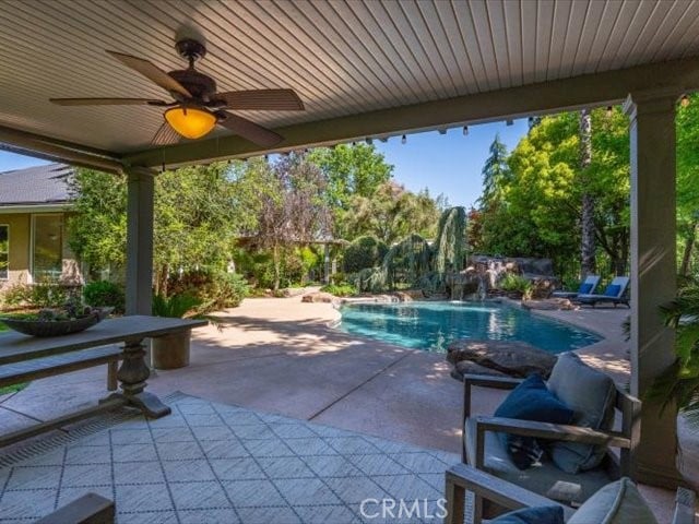 25179 68th Ave, Los Molinos, CA 96055 - view of patio featuring ceiling fan and an outdoor pool