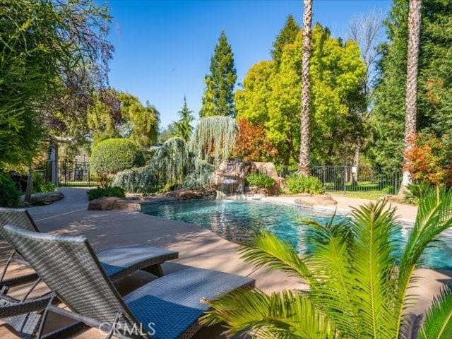 25179 68th Ave, Los Molinos, CA 96055 - view of swimming pool with fence and view of scattered trees