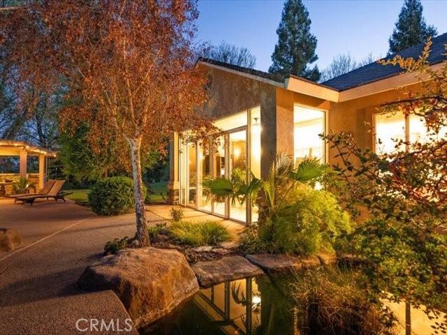 25179 68th Ave, Los Molinos, CA 96055 - view of front of home featuring stucco siding and a patio area