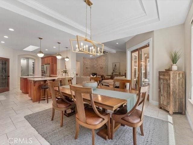 25179 68th Ave, Los Molinos, CA 96055 - dining space featuring a raised ceiling, a chandelier, light tile patterned floors, french doors, and recessed lighting