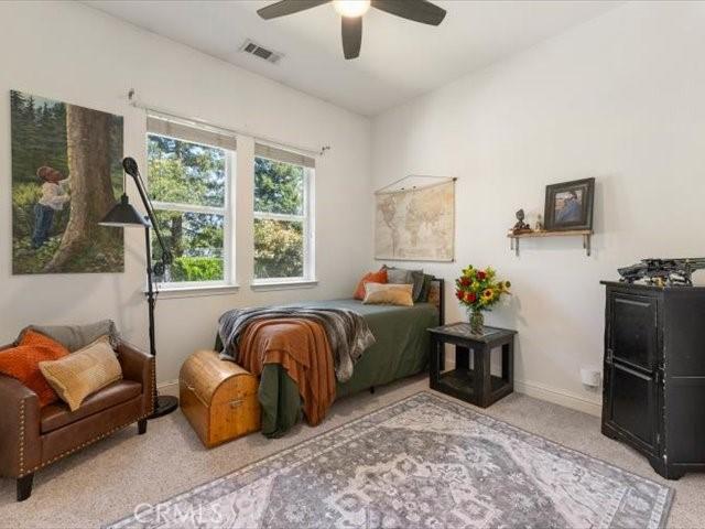 25179 68th Ave, Los Molinos, CA 96055 - carpeted bedroom featuring baseboards and ceiling fan