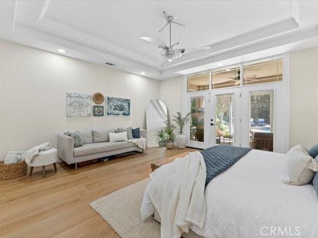 25179 68th Ave, Los Molinos, CA 96055 - bedroom with a raised ceiling, french doors, access to exterior, wood finished floors, and recessed lighting
