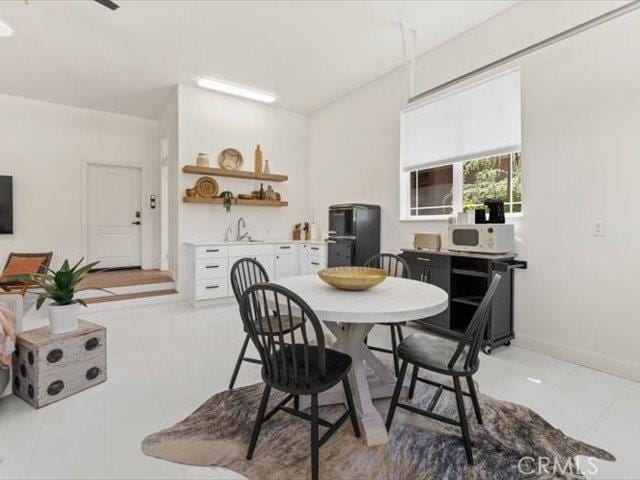 25179 68th Ave, Los Molinos, CA 96055 - dining area with light tile patterned flooring and baseboards