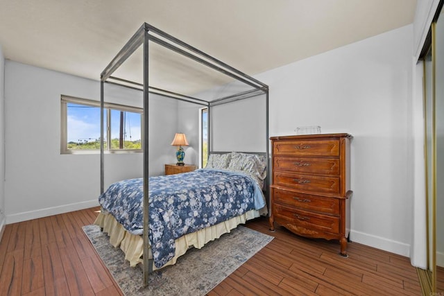 979 Canyon Heights Rd, Fallbrook, CA 92028 - bedroom with baseboards and hardwood / wood-style floors
