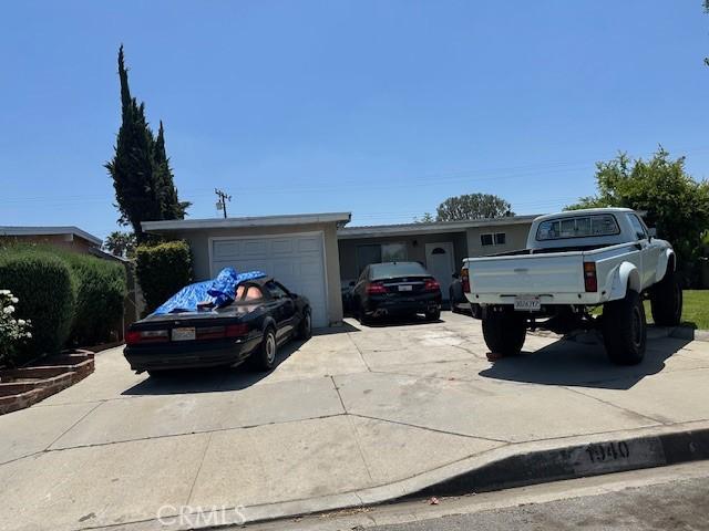 1940 E Walnut Crk, West Covina, CA 91791 - ranch-style home featuring concrete driveway