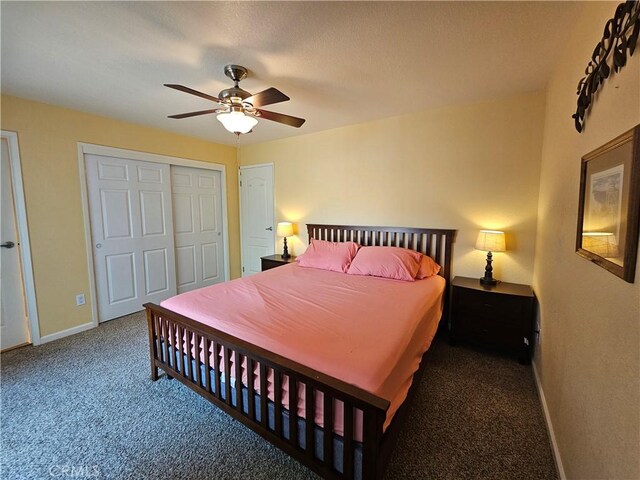 carpeted bedroom featuring baseboards, a ceiling fan, and a closet