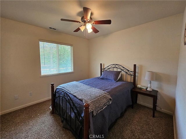 carpeted bedroom with baseboards and ceiling fan