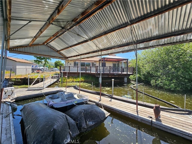 dock area featuring a water view