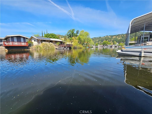 dock area featuring a water view