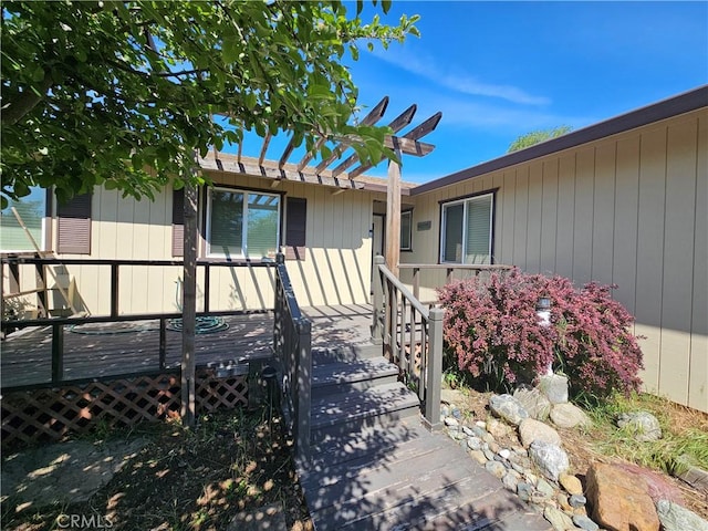 view of front of property with a wooden deck