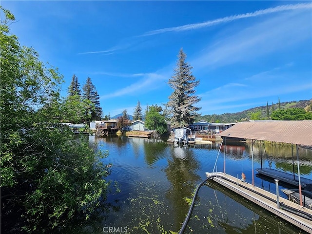 dock area featuring a water view