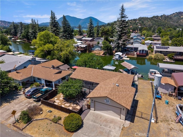 12855 Island Cir, Clearlake Oaks, CA 95423 - aerial perspective of suburban area with a water and mountain view