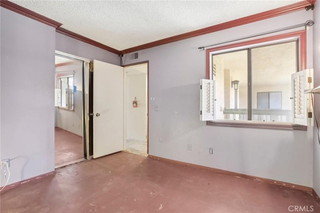 2506 E Willow St Unit 302, Signal Hill, CA 90755 - unfurnished room with ornamental molding, a textured ceiling, concrete flooring, and baseboards