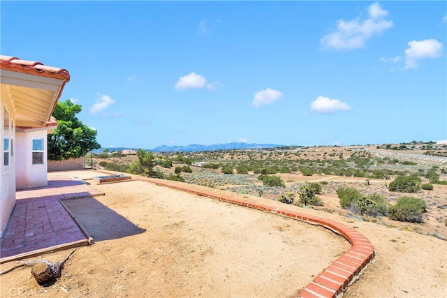 7138 Amanda Way, Hesperia, CA 92345 - view of yard with a mountain view and a patio area