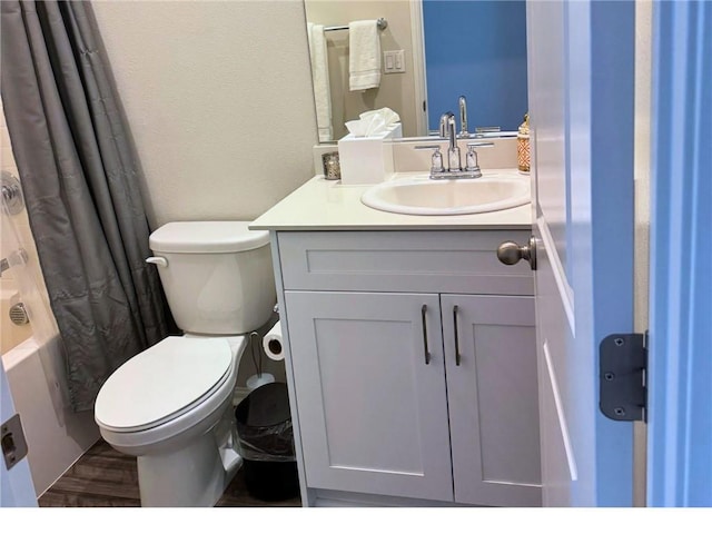 31832 Gimbal Way, Winchester, CA 92596 - full bathroom featuring toilet, vanity, shower / tub combo, and wood finished floors