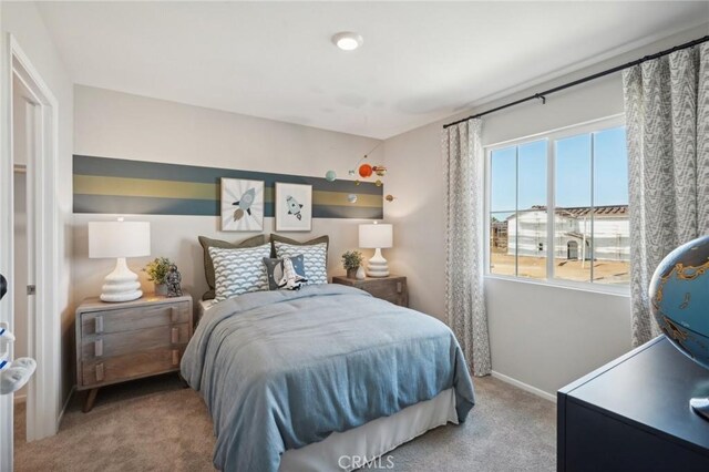 14063 Starlene St, Moreno Valley, CA 92555 - carpeted bedroom featuring baseboards