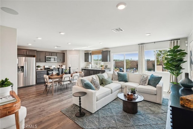 14063 Starlene St, Moreno Valley, CA 92555 - living room featuring recessed lighting and wood finished floors