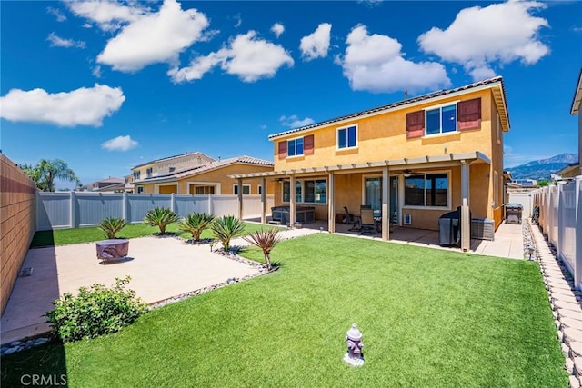 1357 Bannock St, Beaumont, CA 92223 - back of property featuring stucco siding, a patio area, and an outdoor fire pit