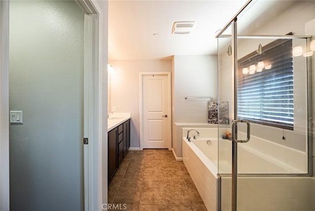1357 Bannock St, Beaumont, CA 92223 - full bath with vanity, a garden tub, and a stall shower