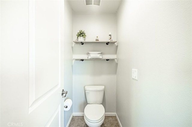 1357 Bannock St, Beaumont, CA 92223 - bathroom featuring toilet and baseboards
