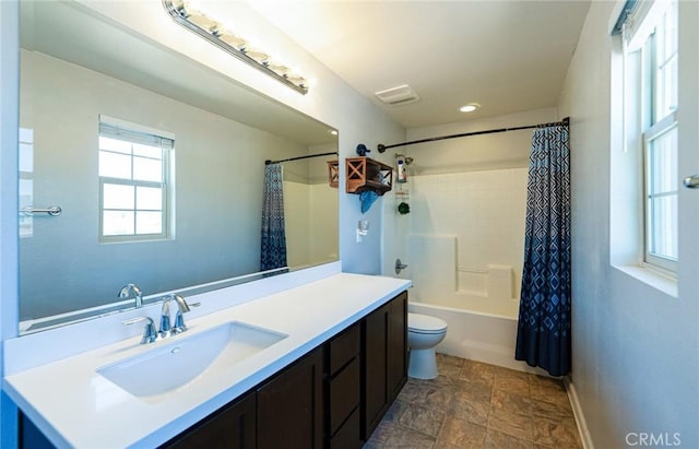 1357 Bannock St, Beaumont, CA 92223 - bathroom with stone finish floors, vanity, toilet, baseboards, and shower / bathtub combination with curtain