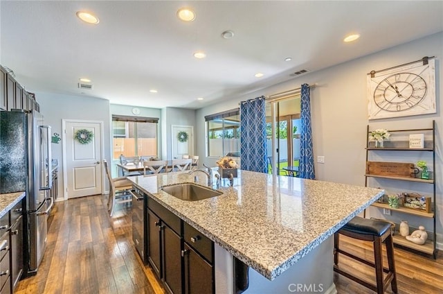 1357 Bannock St, Beaumont, CA 92223 - kitchen featuring freestanding refrigerator, a sink, dishwasher, dark wood-style flooring, and recessed lighting