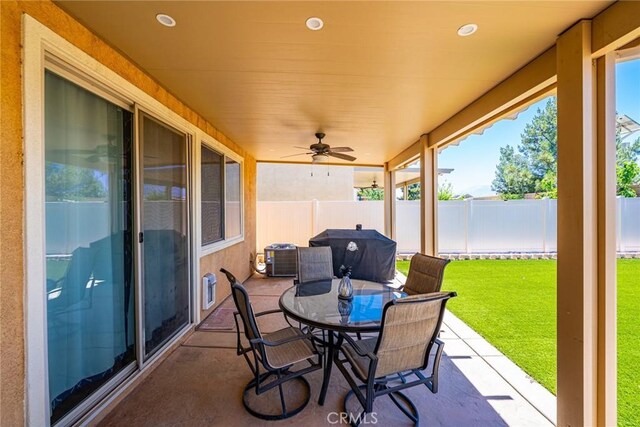 1357 Bannock St, Beaumont, CA 92223 - view of patio / terrace featuring outdoor dining space, a grill, a ceiling fan, and central AC