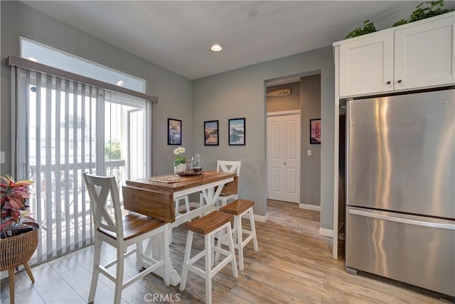 594 Rockaway Ave Unit B, Grover Beach, CA 93433 - dining room with recessed lighting, baseboards, and light wood-style floors