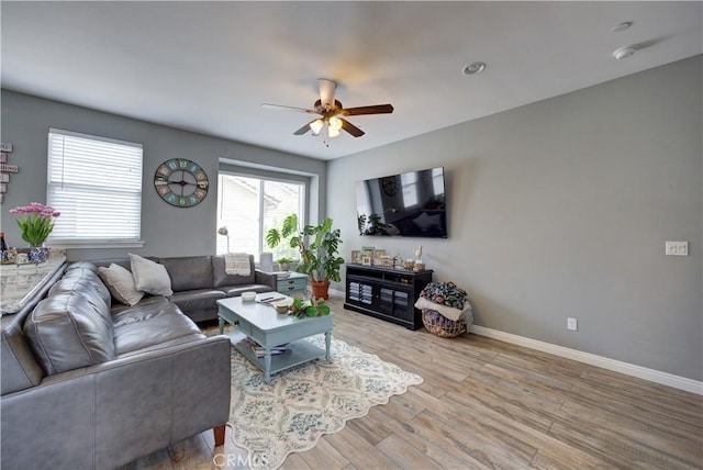 594 Rockaway Ave Unit B, Grover Beach, CA 93433 - living area with a ceiling fan, light wood-style flooring, and baseboards