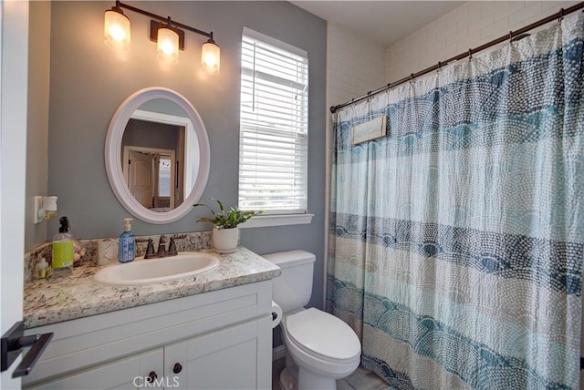 594 Rockaway Ave Unit B, Grover Beach, CA 93433 - full bath with toilet, vanity, plenty of natural light, and curtained shower