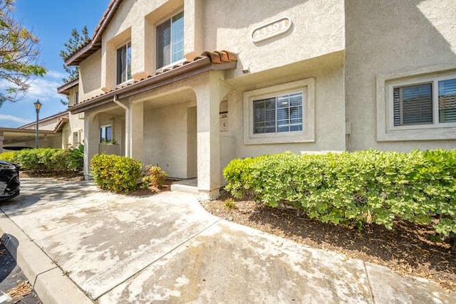23391 La Crescenta Unit 270C, Mission Viejo, CA 92691 - entrance to property featuring stucco siding
