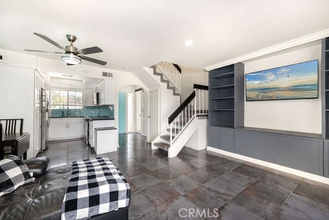 23391 La Crescenta Unit 270C, Mission Viejo, CA 92691 - living area featuring stairs, ceiling fan, dark tile patterned floors, and recessed lighting