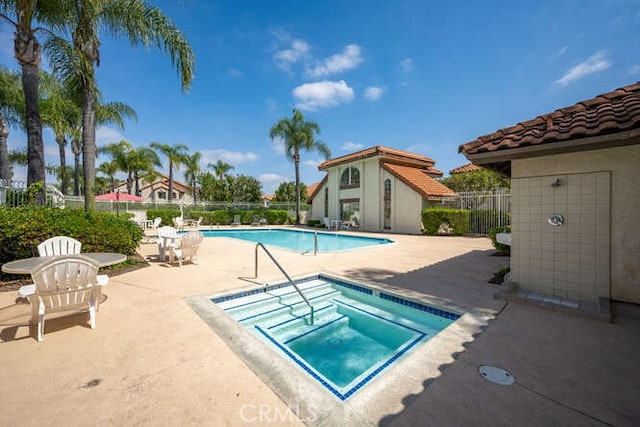 23391 La Crescenta Unit 270C, Mission Viejo, CA 92691 - community pool featuring a community hot tub and a patio