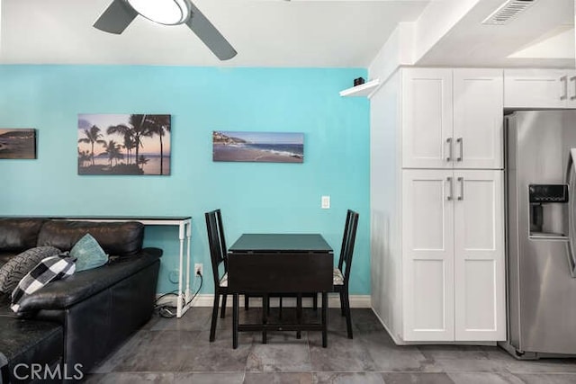 23391 La Crescenta Unit 270C, Mission Viejo, CA 92691 - dining space featuring ceiling fan and baseboards