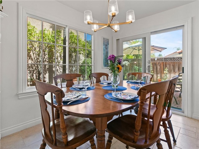 24822 Cutter, Laguna Niguel, CA 92677 - dining area featuring a chandelier, healthy amount of natural light, and baseboards