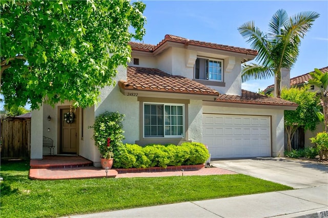 24822 Cutter, Laguna Niguel, CA 92677 - mediterranean / spanish-style home featuring concrete driveway, a tiled roof, stucco siding, and a garage