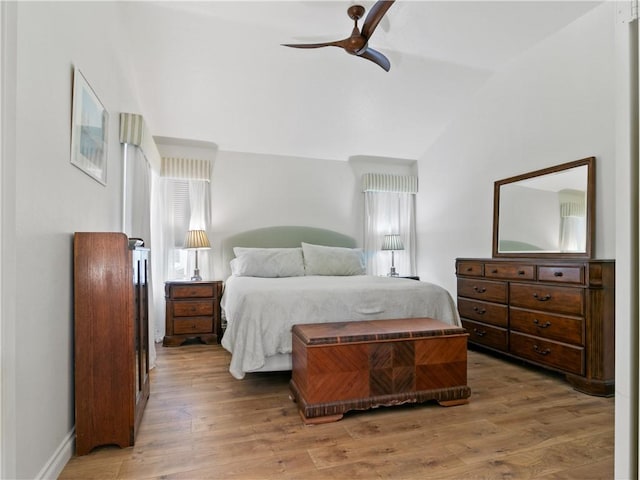 24822 Cutter, Laguna Niguel, CA 92677 - bedroom with light wood-style flooring, vaulted ceiling, and a ceiling fan