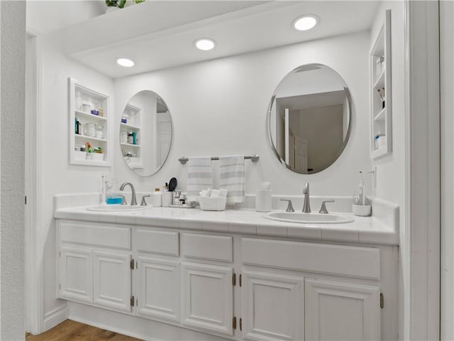24822 Cutter, Laguna Niguel, CA 92677 - bathroom featuring double vanity, wood finished floors, and recessed lighting