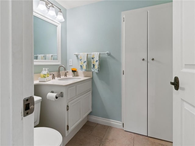 24822 Cutter, Laguna Niguel, CA 92677 - bathroom with toilet, vanity, tile patterned floors, and baseboards