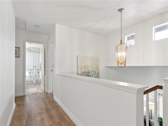 24822 Cutter, Laguna Niguel, CA 92677 - corridor featuring hardwood / wood-style floors, baseboards, and an upstairs landing