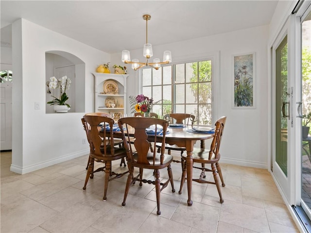 24822 Cutter, Laguna Niguel, CA 92677 - dining room featuring healthy amount of natural light, baseboards, and a chandelier