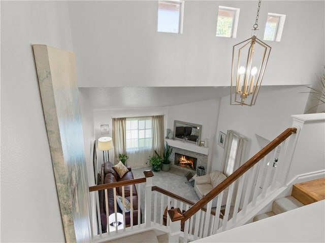24822 Cutter, Laguna Niguel, CA 92677 - staircase with a towering ceiling and a lit fireplace