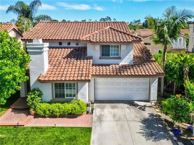 24822 Cutter, Laguna Niguel, CA 92677 - mediterranean / spanish home with a tile roof, stucco siding, driveway, a garage, and a chimney